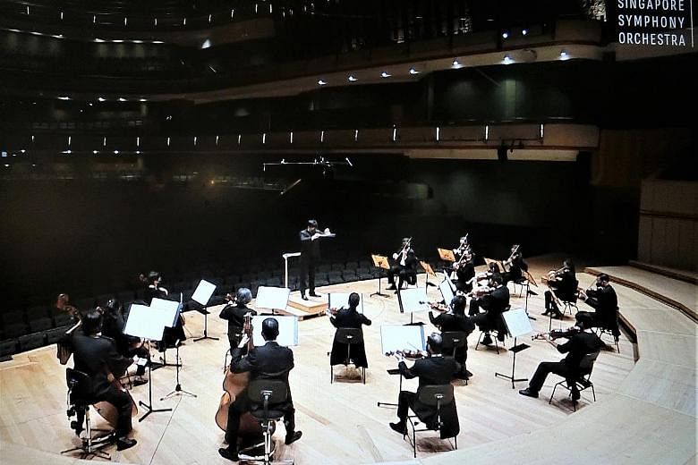 Home-grown conductor Wong Kah Chun leading the Singapore Symphony Orchestra in a chamber concert streamed online.