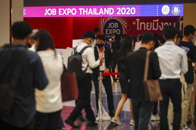 Thais waiting to enter the Job Expo Thailand 2020 in Bangkok last Saturday. South-east Asia's second-largest economy could shrink by a record 8.5 per cent this year, with its key tourism sector taking a severe beating, the government predicts, leavin