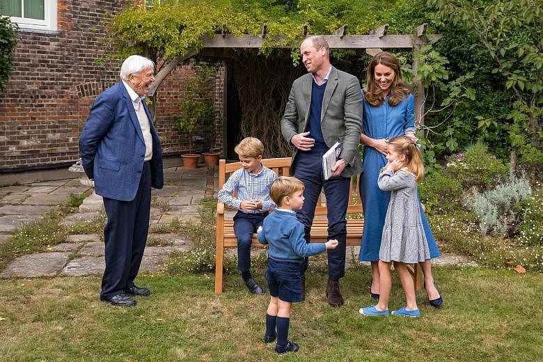 BRITISH ROYALS JOIN DAVID ATTENBOROUGH AFTER FILM SCREENING: Britain's royal family have released pictures of Prince William, his wife Kate Middleton and their three children joining naturalist David Attenborough in the gardens of Kensington Palace. 
