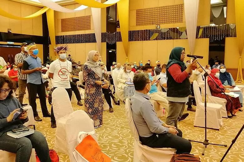 People attending Tuesday's town hall in Pulau Carey, Selangor, to voice their objections to the state government's plans. Some 100 Orang Asli and environmentalists were there, along with several Selangor lawmakers. ST PHOTO: HAZLIN HASSAN