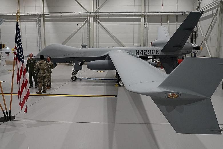 A US Air Force MQ-9 Reaper drone at Amari Air Base in Estonia. The report by a bipartisan House panel in the US found that although the Pentagon had been experimenting with AI, machine learning and even semi-autonomous weapons systems for years, "cul