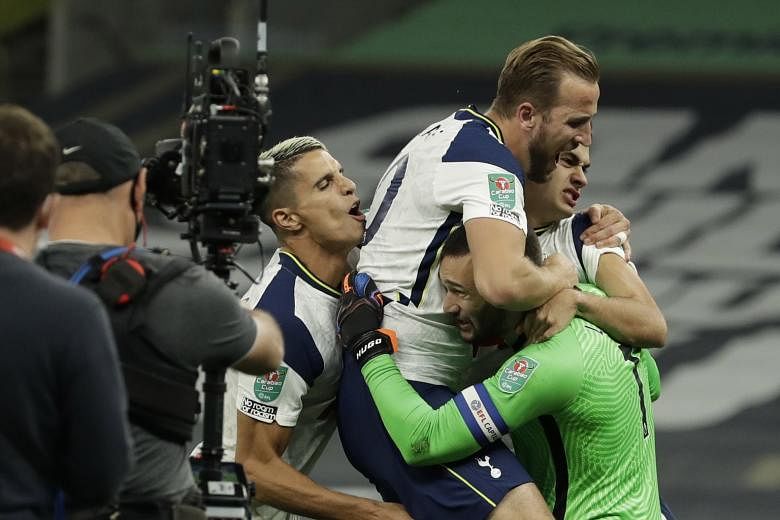 Top: Tottenham's Harry Kane and other players jumping on goalkeeper Hugo Lloris after their 5-4 penalty shoot-out win over Chelsea at home. Above: Mason Mount's penalty beating Lloris but clipping the post to put Spurs through to the League Cup quart
