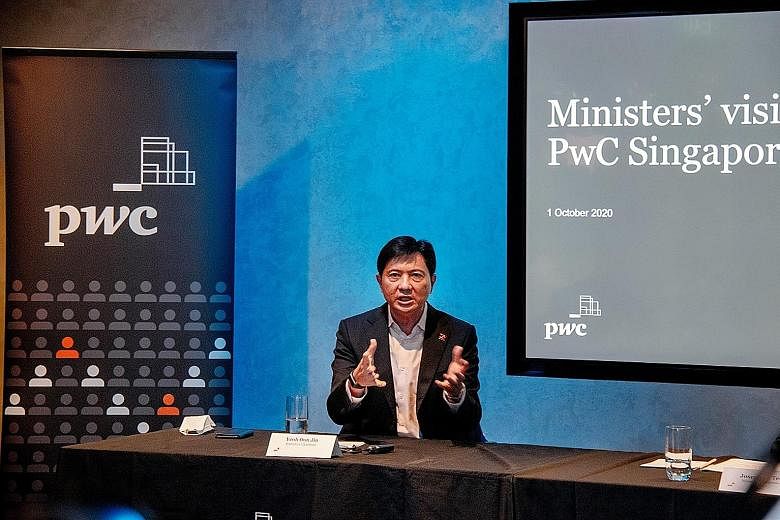 PwC Singapore executive chairman Yeoh Oon Jin speaking to the media yesterday. He said more skilled workers are needed to meet a growing demand for digital-related business transformation support services.