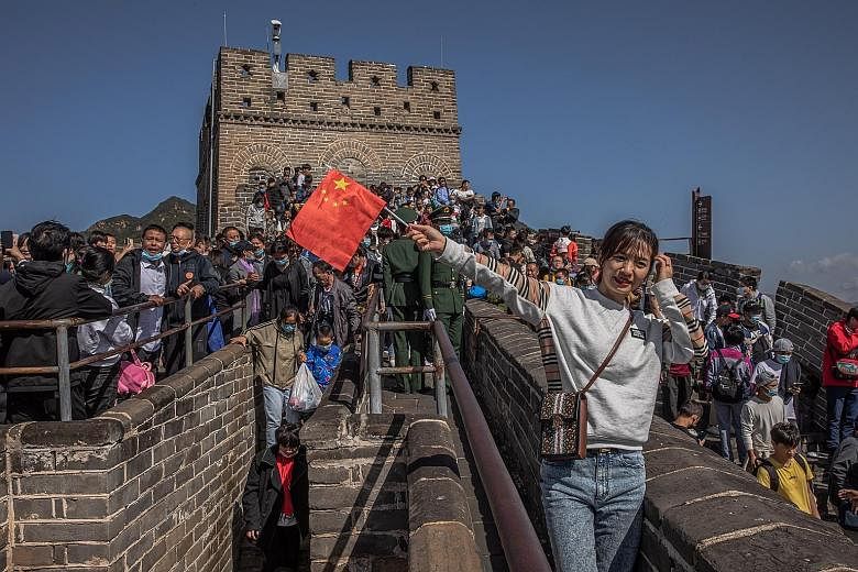 Domestic tourism is getting a big boost with people free to travel within China, and the Great Wall drew huge crowds yesterday. Even Wuhan, where the coronavirus outbreak began, is seeing a visitor influx.