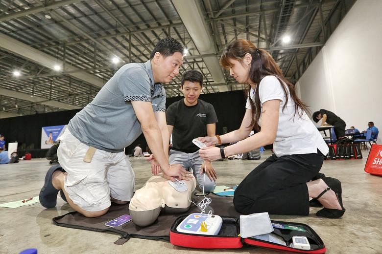 With time being the enemy, the best chance a cardiac arrest victim has to survive is if someone who has witnessed the event - a "bystander" - starts cardiopulmonary resuscitation and uses an automated external defibrillator, says the writer. PHOTO: L