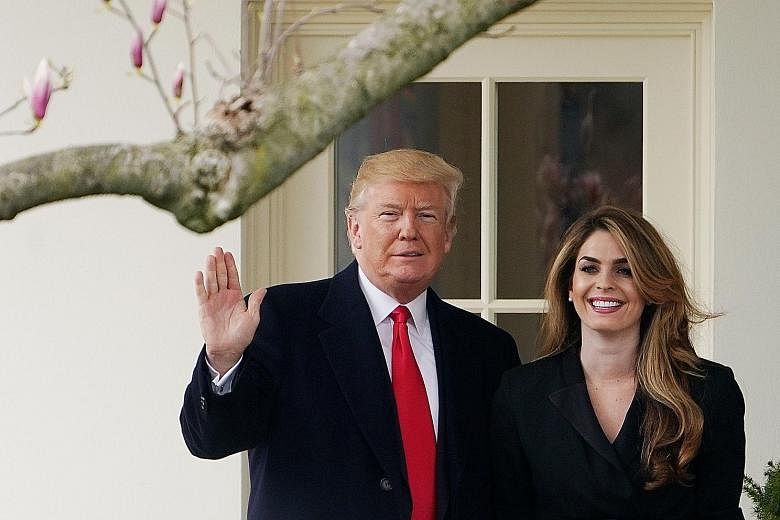 US President Donald Trump with his close aide Hope Hicks, a former White House communications director, in a 2018 photo. Mr Trump's diagnosis came after news broke that Ms Hicks, who was among his entourage aboard Air Force One this week as they head