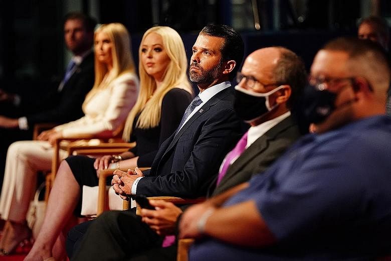 Trump family members (from right) Donald Trump Jr, Tiffany Trump, Ivanka Trump and Eric Trump at the presidential election debate in Cleveland, Ohio, on Tuesday.