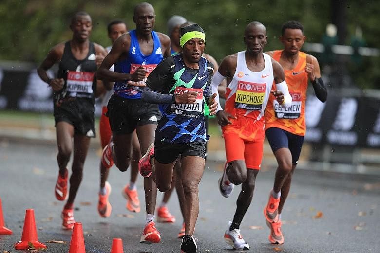 Shura Kitata leading the pack, which included 2016 Rio Games gold medallist Eliud Kipchoge of Kenya, en route to a shock London Marathon win on Sunday. The Ethiopian came home first in 2hr 5min 41sec to go one better than his second-placed finish in 
