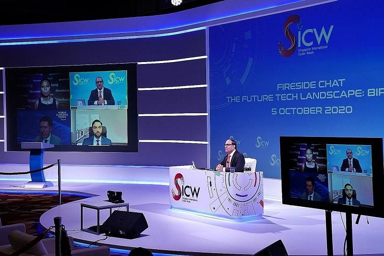 Communications and Information Minister S. Iswaran speaking yesterday at a dialogue that opened this year's Singapore International Cyber Week. SICW is being held in a mostly virtual format this year amid the pandemic. Mr Iswaran likened his vision f