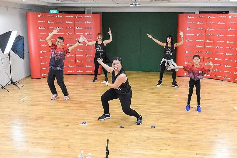 For 21/2 hours last Sunday morning, almost 400 Singaporeans - including Minister for Culture, Community and Youth Edwin Tong (left) - danced, jabbed and kicked to help raise over $33,000 for the Children's Cancer Foundation as part of the Love is Hop