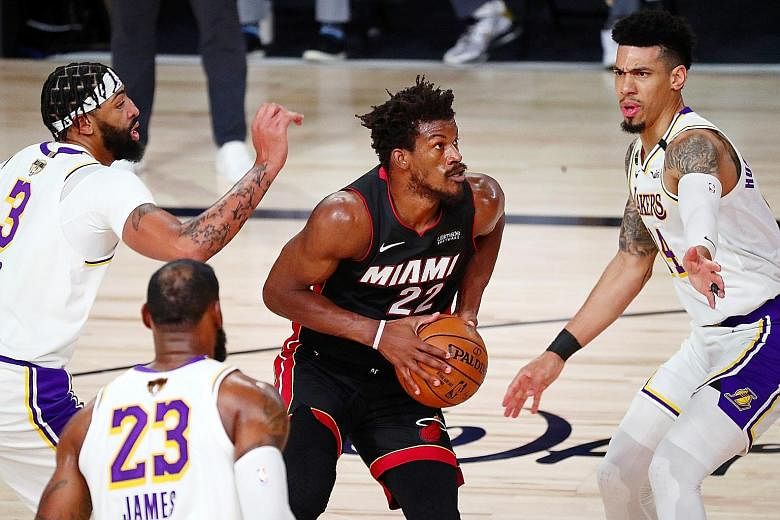 Miami Heat forward Jimmy Butler en route to recording a game-high 40 points, 13 assists and 11 rebounds on Sunday, helping the Eastern Conference winners claw back a game. The Los Angeles Lakers still lead the NBA Finals 2-1 ahead of Game 4 today. PH