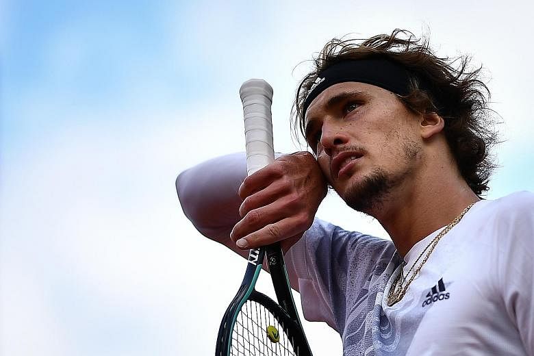 Alexander Zverev played on Sunday despite having Covid-like symptoms. French Open officials say he did not inform them that he was unwell when he arrived for his match. PHOTO: AGENCE FRANCE-PRESSE