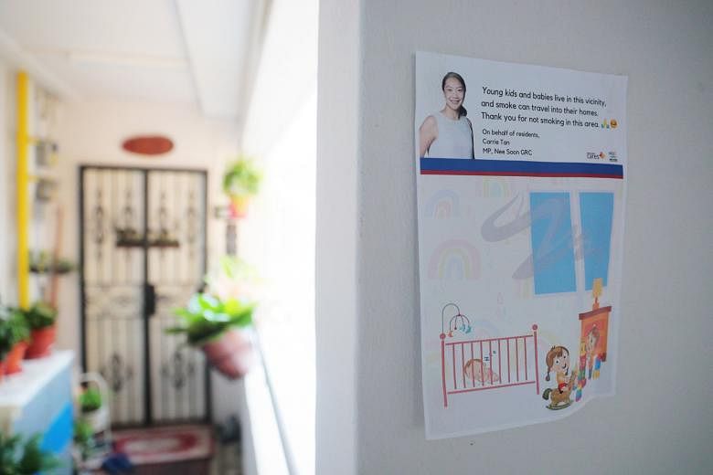 A smoking advisory at the stairwell of a Housing Board block in Yishun. Mr Louis Ng, chairman of the Government Parliamentary Committee for Sustainability and the Environment, said the issue of second-hand smoke from neighbours has persisted over the