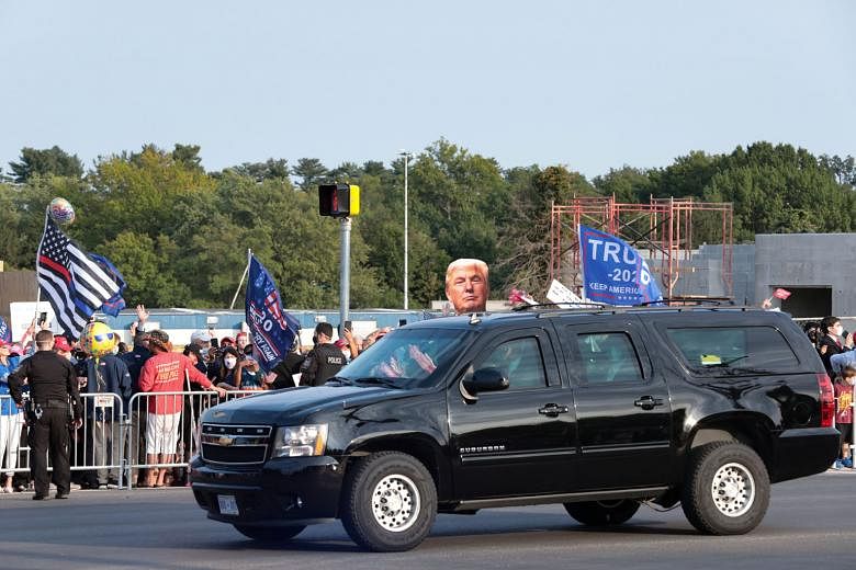 US President Donald Trump's excursion to greet supporters outside the Walter Reed National Military Medical Centre has been criticised by a physician as an act of insanity. PHOTO: REUTERS