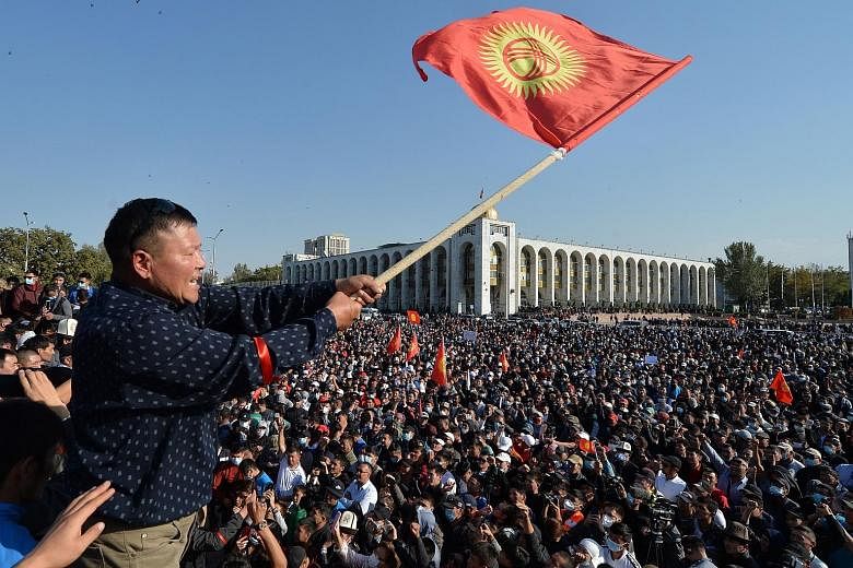 President Sooronbai Jeenbekov ordered security forces not to open fire on protesters (above), seen in Bishkek on Monday amid an outcry over the results of the previous day's parliamentary election.