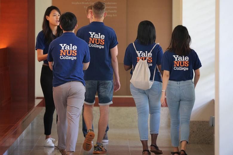 Students at the Yale-NUS College campus last year. Education Minister Lawrence Wong said yesterday in Parliament that no Singaporean is displaced from a university place because of an international student.