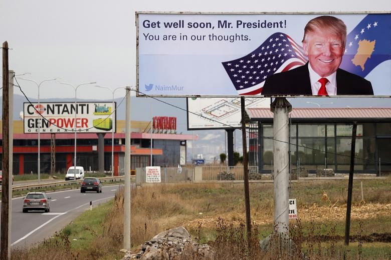 A billboard near Pristina International Airport in Slatina, Kosovo, yesterday. 