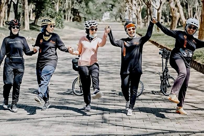 A group of Indonesian housewives posted a photo of them on a cycling trip. Only one had a mask but it was lowered. One of them told The Straits Times: "We have known each other for very long and we have been staying in touch constantly... We are all 