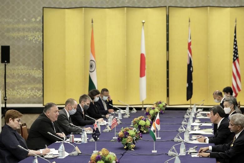 US Secretary of State Mike Pompeo (second from left) at the Quad session in Tokyo yesterday with Japan's Foreign Minister Toshimitsu Motegi (second from right), India's Foreign Minister Subrahmanyam Jaishankar (right) and Australia's Foreign Minister