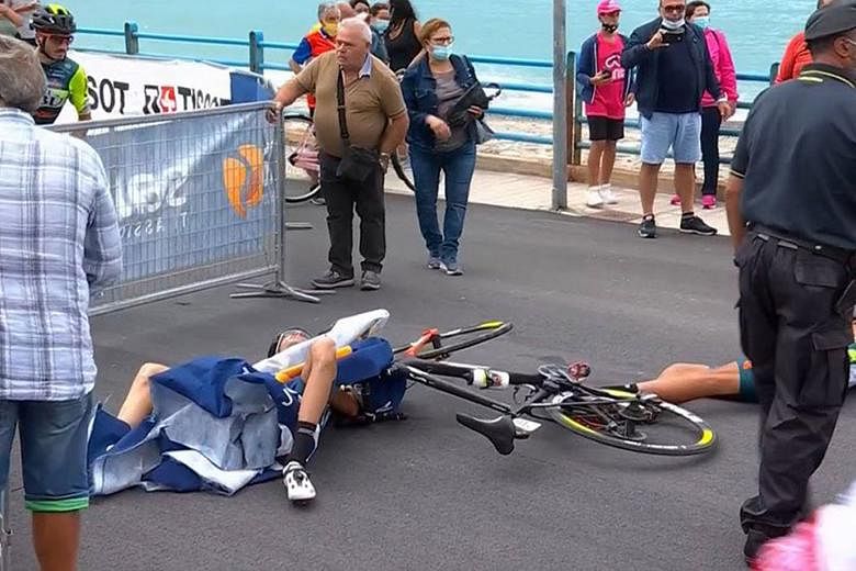Italian cyclist Luca Wackermann was struck by a barrier blown over by a helicopter. 