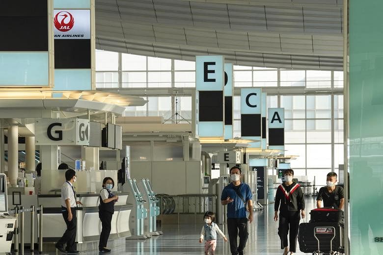 The departure level at Tokyo International Airport in Haneda. Japan currently bans travel to 159 countries and regions, but will ease restrictions on travel to 12 places, reported the Yomiuri newspaper.