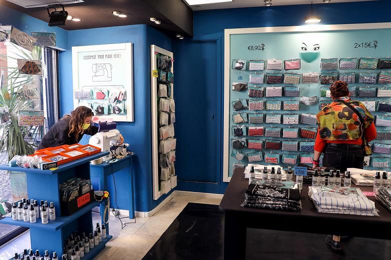 A worker sewing protective face masks at a shop in Rome on Thursday. As a region, Europe is now reporting more coronavirus cases than India, Brazil or the United States. 