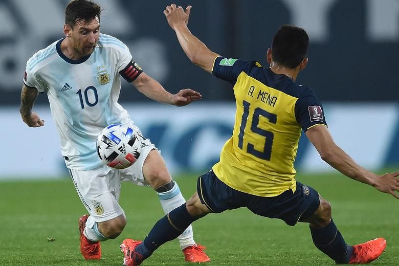 Argentina captain Lionel Messi eluding Ecuador's Angel Mena in their World Cup qualifier in Buenos Aires on Thursday. The 2022 Finals will arguably be the 33-year-old superstar's last chance to win the title.