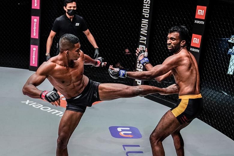 Singaporean MMA fighter Amir Khan landing a kick on India's Rahul Raju at One Championship's Reign of Dynasties event last night. Amir knocked out his opponent in the first round.