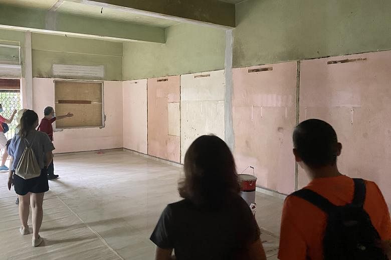 A peek at a modern-day brothel in Petain Road undergoing renovation. Sex workers used to ply their trade from tiny rooms - visible by vertical marks on the wall made by partitions about 1.8m apart. 