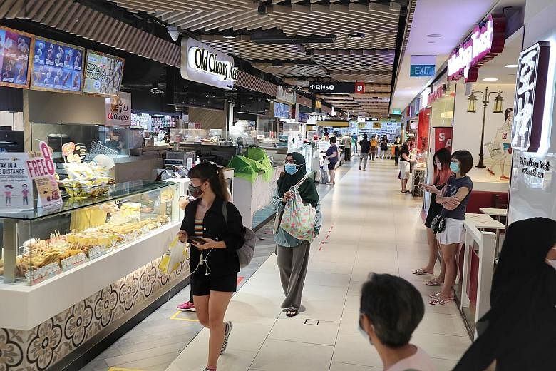 Singapore Press Holdings' property business - which includes retail properties such as The Clementi Mall (above) - posted a better showing than the company's media segment, rising 10.3 per cent to $327.2 million. But the loss before tax was $75.8 mil