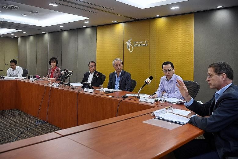 National Wages Council chairman Peter Seah (third from left) with (from left) NTUC assistant secretary-general Desmond Choo; NTUC president Mary Liew; Singapore National Employers Federation president Robert Yap; Permanent Secretary for Manpower Aube