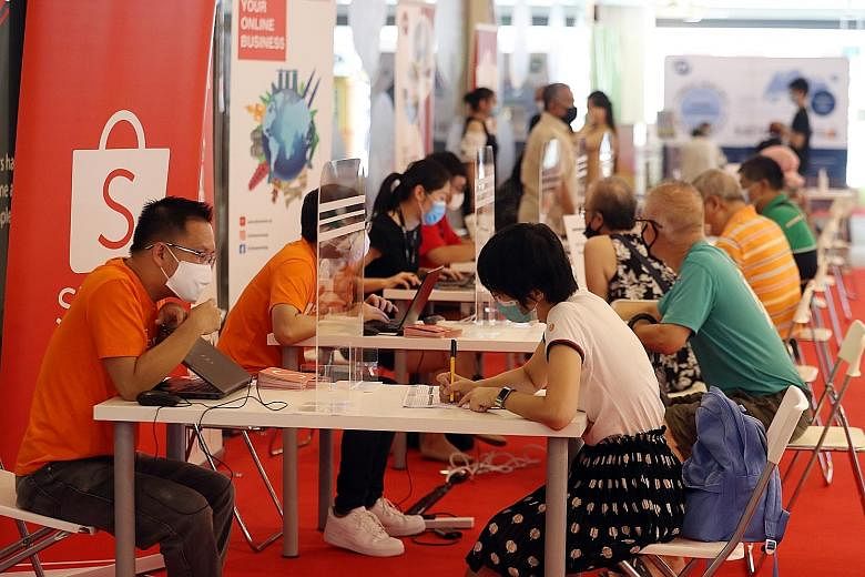 Out of the 1,400 jobs on offer at the career fair in Our Tampines Hub, 280 were for professional, manager, executive and technician (PMET) roles. Other forms of support for job seekers were available from social agencies and organisations which also 