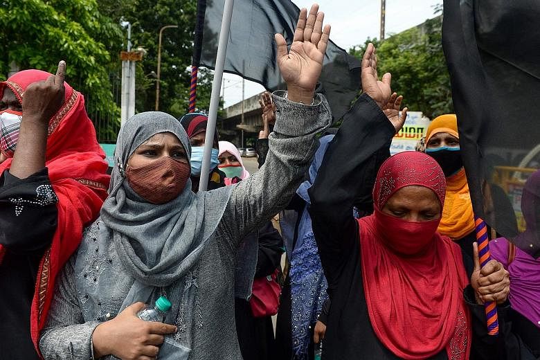 Members of Islamic organisation India Thowheed Jamaath (left) protesting in Chennai earlier this month after the acquittal of leaders of the ruling Bharatiya Janata Party (BJP) of their alleged roles in the 1992 mosque demolition. Among those acquitt