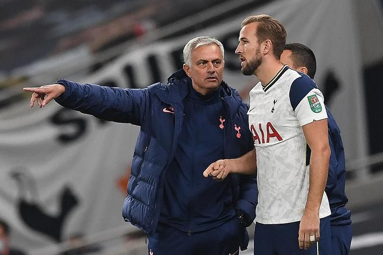 Above: Gareth Bale is not a certain starter against West Ham today. Left: Jose Mourinho with Harry Kane, who will combine with Son Heung-min and Bale to form a deadly front trio.