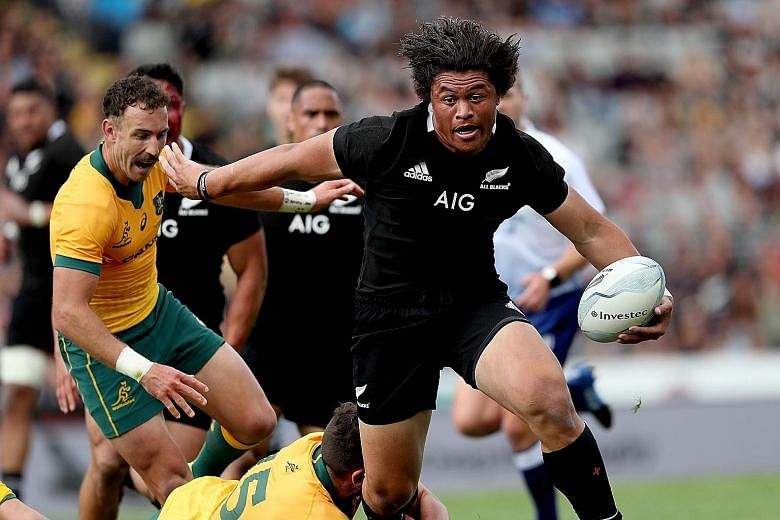 New Zealand's Caleb Clarke making a break in the Bledisloe Cup match against Australia in Auckland. He played a huge role in two tries early in the second half that put the All Blacks on the way to a 27-7 win. PHOTO: AGENCE FRANCE-PRESSE