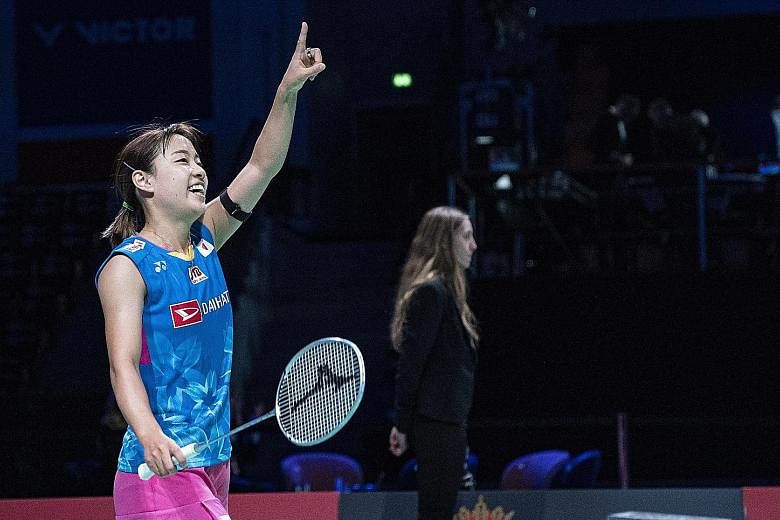 A joyous Nozomi Okuhara of Japan after beating Carolina Marin of Spain 21-19, 21-17 at the Denmark Open in Odense. It was the Rio 2016 bronze medallist's first badminton tour title after six recent straight losses in finals.