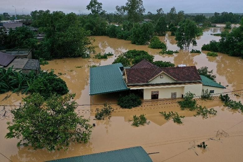A flooded village in Quang Tri province, Vietnam, yesterday. Heavy rain has pounded the region for more than a week.