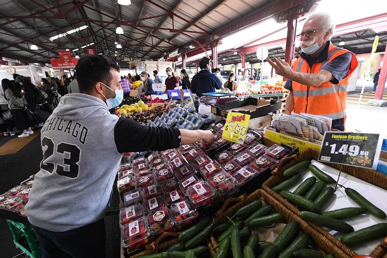 Queen Victoria Market in Melbourne yesterday. After more than 100 days in a strict lockdown that allowed only for two hours of outdoor activity a day, the five million people living in Melbourne, Victoria's capital, will be able to spend as much time