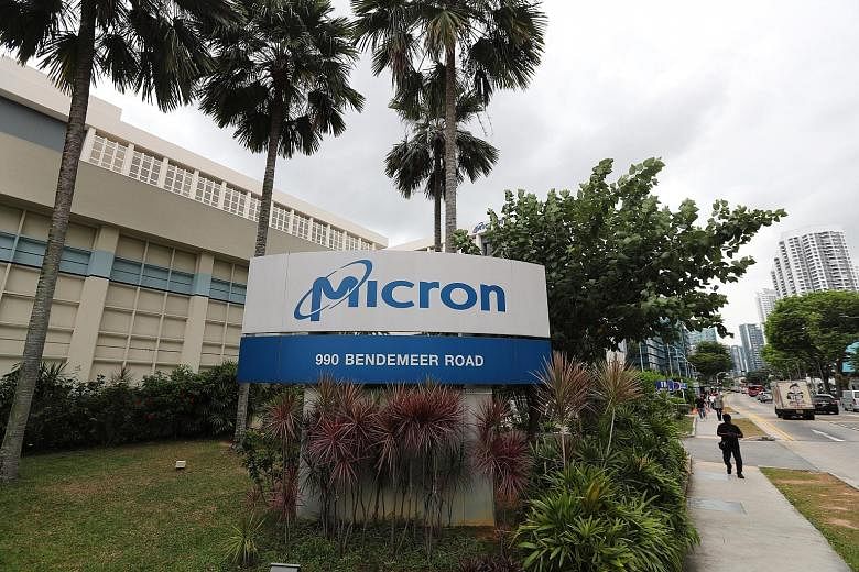 Firms like Micron Technology (far left) and Infineon Technologies (left) now lead Singapore's semiconductor industry. ST PHOTOS: KELVIN CHNG, JOYCE FANG