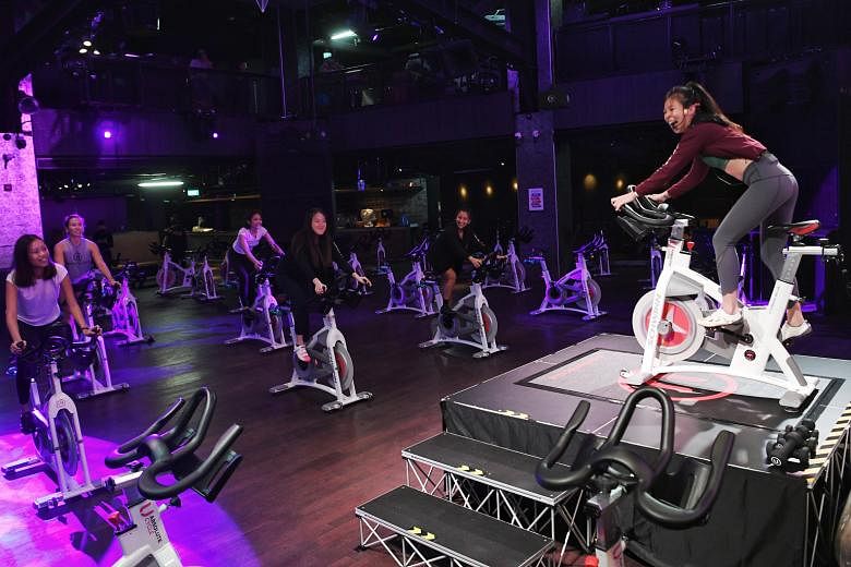 Zouk nightclub's dance floor, which has been transformed into a spin studio. Education Minister Lawrence Wong said there will be measures to help nightlife businesses exit, transit and pivot to new areas. ST PHOTO: KHALID BABA