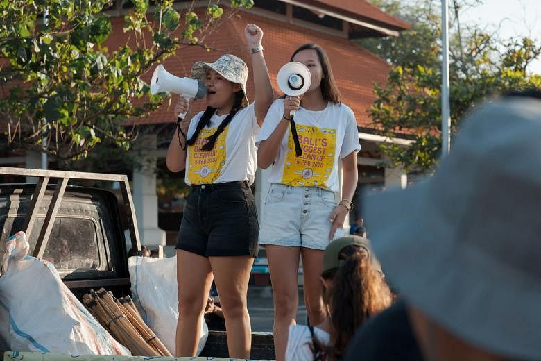 The Wijsen sisters Isabel (left) and Melati making their pitch for the environment during Bali's Biggest Clean-Up event in February. They started their Bye Bye Plastic Bags initiative seven years ago.