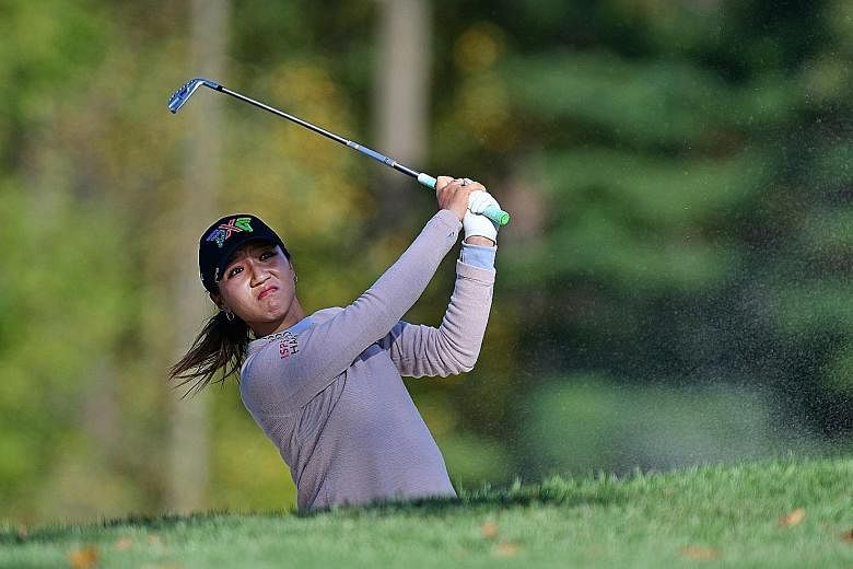 Lydia Ko hitting from a fairway bunker at the Women's PGA Championship in Pennsylvania two weeks ago, when she tied for 18th. She has two top-10 finishes this season and is seeking her 16th career LPGA title. PHOTO: REUTERS