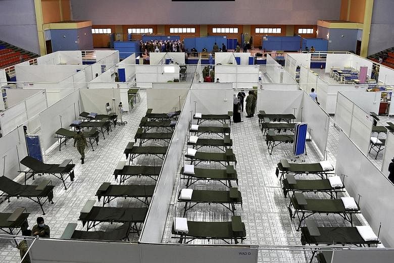 Beds for Covid-19 patients at the Tawau Sports Complex in Sabah. The Malaysian state yesterday again logged the highest number of 528 cases, or 74.3 per cent of the country's 710 daily cases.