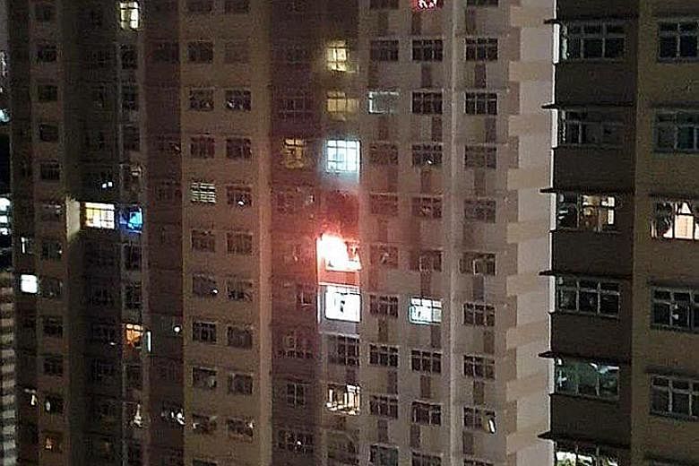 Private-hire driver Goh Keng Soon, 40, died two days after the fire broke out in his flat in Bukit Batok (left) in July last year. The coroner's court heard that the path to safety for him and his family might have been blocked as the burning persona