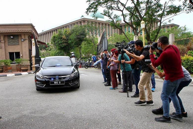 A minister leaving after a special Cabinet meeting chaired by Prime Minister Muhyiddin Yassin in Putrajaya yesterday. PHOTO: THE STAR/ASIA NEWS NETWORK