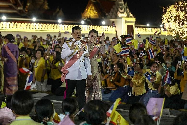 Thai King Maha Vajiralongkorn and Queen Suthida greeting royalist supporters after a Buddhist ceremony at the Grand Palace in Bangkok yesterday for the late King Chulalongkorn, known as Rama V, who earned a reputation as a moderniser.