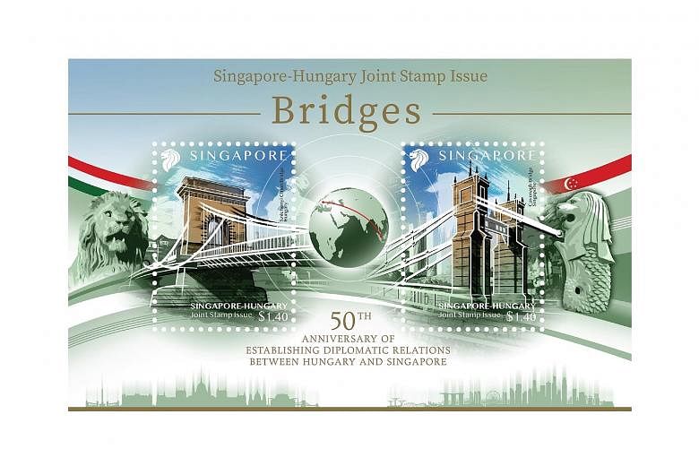 The joint stamp issue features Budapest's Szechenyi Chain Bridge on the left and Singapore's Cavenagh Bridge on the right.