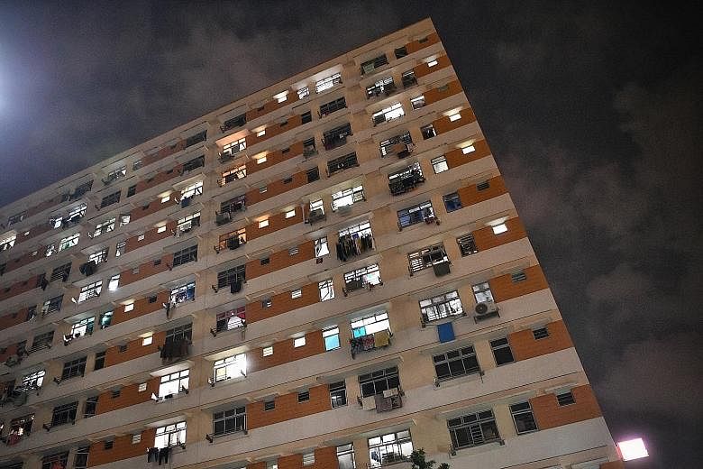 Four individuals residing in four different units at Block 174D (left) in Hougang Avenue 1 were diagnosed with tuberculosis between January 2018 and June this year. MOH said current and former residents of the block will be offered the voluntary free
