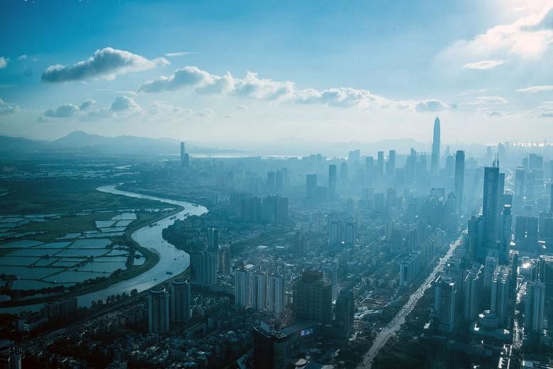 The Chinese city of Shenzhen (right) separated by a river from Hong Kong. Shenzhen was chosen as a special economic zone because of its proximity to shipping routes and Hong Kong, Macau and Taiwan. Its transformation from sleepy fishing village to tech an