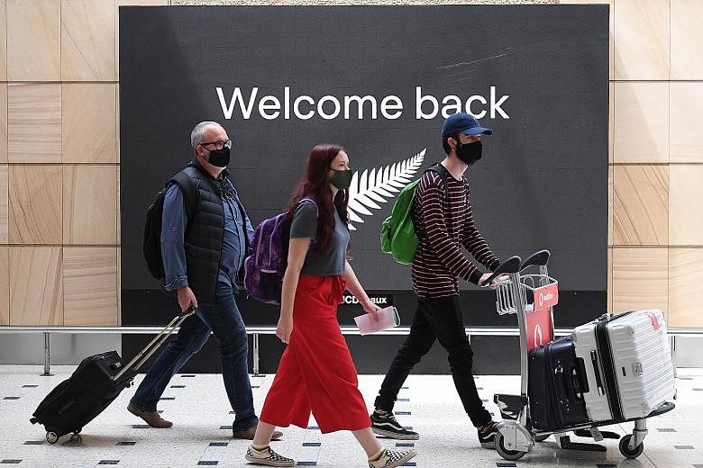 Passengers from New Zealand at Sydney Airport in New South Wales state on Oct 16, the day that Australia's travel bubble with New Zealand came into effect. The arrangement proved controversial after some passengers flew on to states outside the bubbl